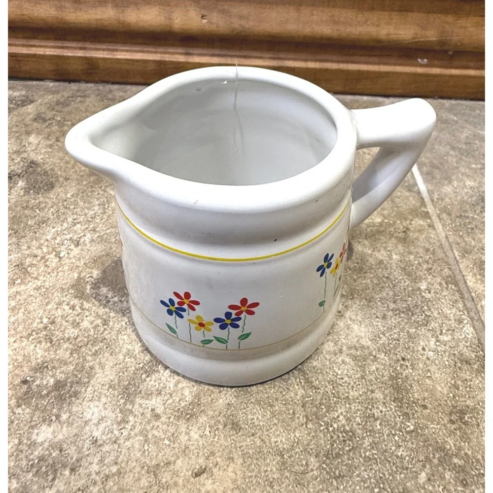 Vintage ceramic‎ 3/4 cup measuring pitcher with charming floral design.